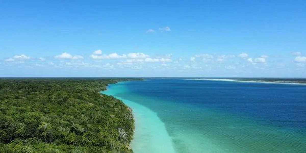 Aerial view of Laguna Bacalar's gradient of blue waters